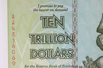 The text is ten trillion dollars close up on a Zimbabwe banknote.