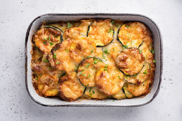 casserole with zucchini squash and cheese in baking dish