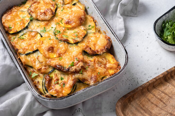 casserole with zucchini squash and cheese in baking dish