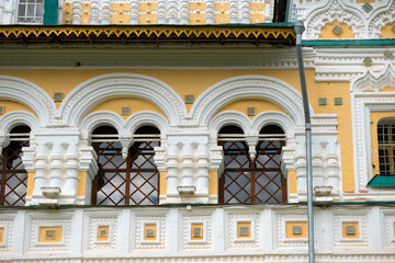 The windows of the Cathedral of the Resurrection of Christ are decorated with stone carvings. In the city of Tutaev, Russia