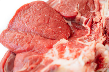 piece of beef on bone on white background.natural and eco-friendly farm products