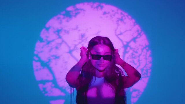 three sexy girls dance in the studio