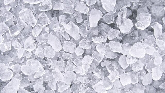 Super Slow Motion Shot of Falling Crushed Ice Background at 1000 fps.