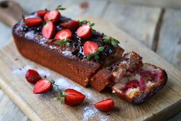 Chocolate strawberry muffin. Summer pastries.