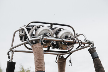 Hot air balloon gas burner on the background of the sky. close-up