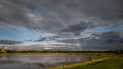 Fototapeta premium Clouds and rainbow