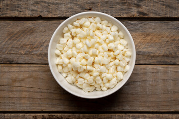 White hominy for mexican pozole on wooden background