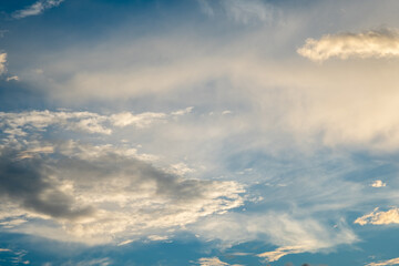 Dramatic clouds in brilliant blue sky with bright white leading edge