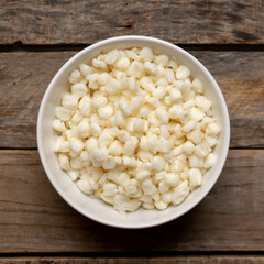 White hominy for mexican pozole on wooden background