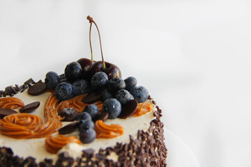 chocolate cake with cherry. cake with chocolate and cream