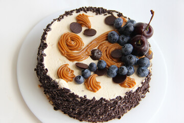 cake with cream and berries