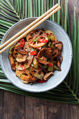 Lotus root or Rhizome stir-fry with Shiitake mushrooms, spices, hot peppers, dark soy sauce and green onions