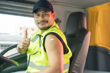 happy smiling Asian man truck driver show shoulder get vaccine Immunity prevent Covid-19