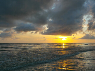 Fototapeta na wymiar Stormy dusk on Redington Shores. Background seascape and calming environment.