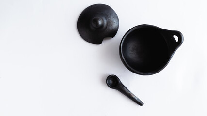 black clay dish, a traditional Colombian dish for serving chili peppers