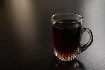 Transparent cup of espresso. cup with coffee.