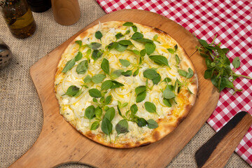 Brazilian pizza with cheese, mozzarella and basil