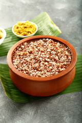 Organic red rice porridge ,kongee, kanji, Asian vegan diet breakfast,