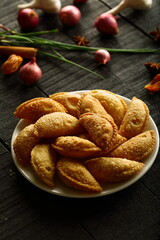 Asian street foods background- spicy curry puff pastry.