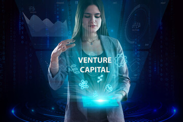 Business, Technology, Internet and network concept. Young businessman working on a virtual screen of the future and sees the inscription: Venture capital