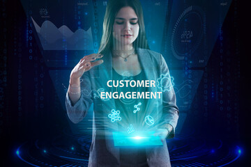 Business, Technology, Internet and network concept. Young businessman working on a virtual screen of the future and sees the inscription: Customer engagement