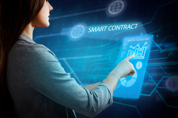 Business, Technology, Internet and network concept. Young businessman working on a virtual screen of the future and sees the inscription: Smart contract