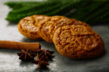 Oven fresh homemade cookies on a rustic kitchen table.
