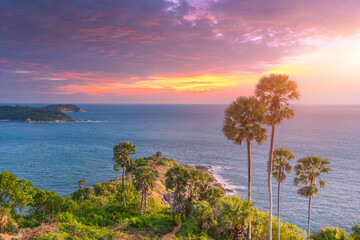 Fototapeta na wymiar Landscape view point of Laem Phromthep Cape at sunset sky. The most famous tourist attraction in Phuket province, Thailand.