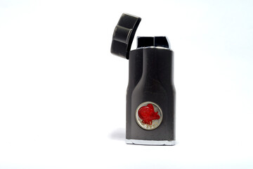 Vintage cigarette lamp in white background