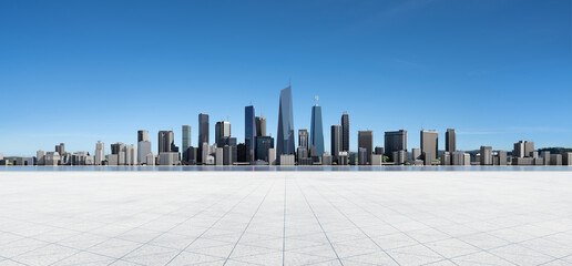 Panoramic view of empty concrete tiles floor with city skyline. © jamesteohart