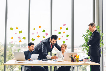 Group of professional business meeting and discussing strategy with new startup project.Creative business people planning and brainstorm with laptop computer in modern office.Teamwork concept