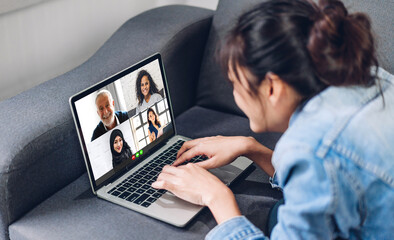 Woman talk speak using laptop computer working and video conference online meeting with colleagues at home.Creative woman talk video chat call with business team.work from home concept