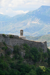 Panorama over Gjirokastra in Albania with the bell tower, clock tower of Kalaja e Gjirokastres...
