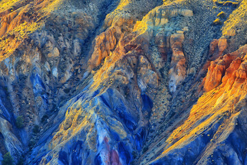 multicolored mountains, geological texture background, multicolor deposits of minerals, landscape