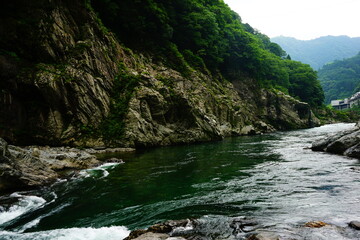 Fototapeta na wymiar Yoshino River Flow and Oboke and Koboke Gorges in Tokushima, Japan - 日本 徳島県 吉野川 粗谷 大歩危 小歩危