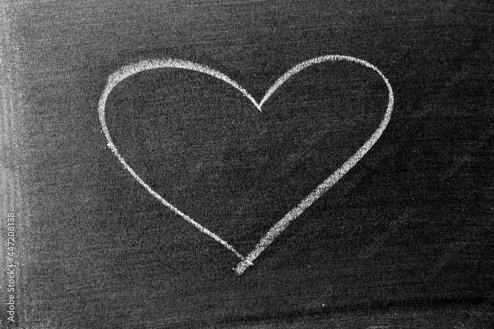 Poster White color chalk hand drawing in heart shape on blackboard or chalkboard background