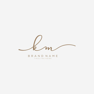 Letter KM gold Initial handwriting design logo template.
