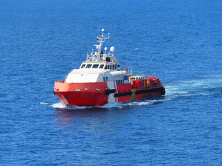 Supply boat transfer the cargo for supporting  oil and gas industry and moving cargo from the boat...