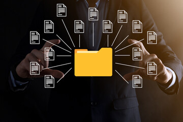 Document Management System (DMS).Businessman hold folder and document icon.Software for archiving, searching and managing corporate files and information.Internet Technology Concept.Digital security.