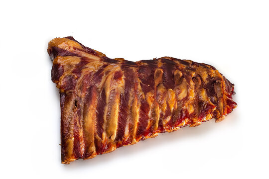 Close-up Of Smoked Baby Back Pork Ribs Isolated On A White Background