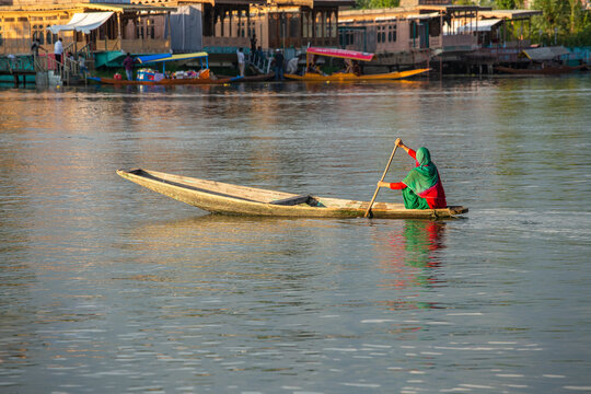 Lifestyle in Dal lake, local people use Shikara, a small boat for transportation in the lake of Srinagar, India