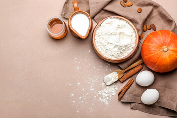 Fototapeta na wymiar Ingredients for preparing bakery and utensils on color background