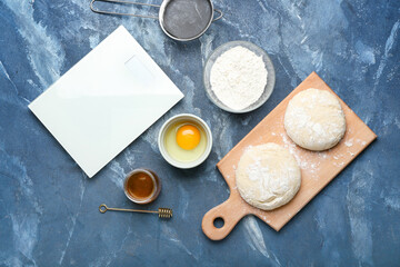 Ingredients for preparing bakery and utensils on color background