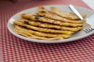 traditional turkish cuisine, street food: pancake. cooked, sliced ​​and ready to eat