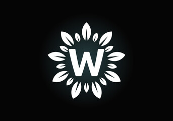 Initial W monogram letter alphabet with leaf wreath. Green leaf, flower logo design concept. Modern vector logo design for business, and company identity.
