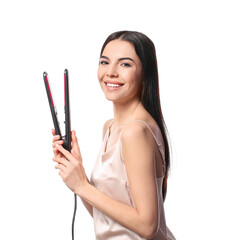 Fototapeta premium Beautiful young woman with flattening iron on white background