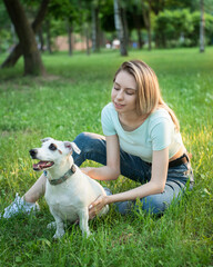 Woman playing with a dog