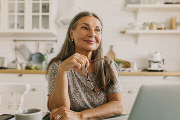 Joyful dreaming lady stay in thoughts. Woman with pensive look. New idea for writing, inspiration...