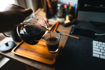 drip coffee in house,Pouring a hot water over a drip coffee