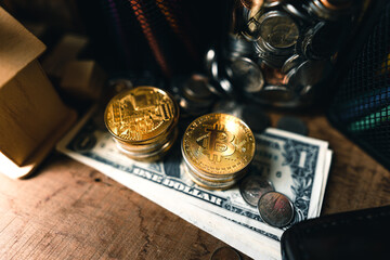 Bitcoin coins on a wooden desk